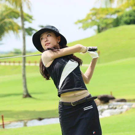 A golfer mid-swing